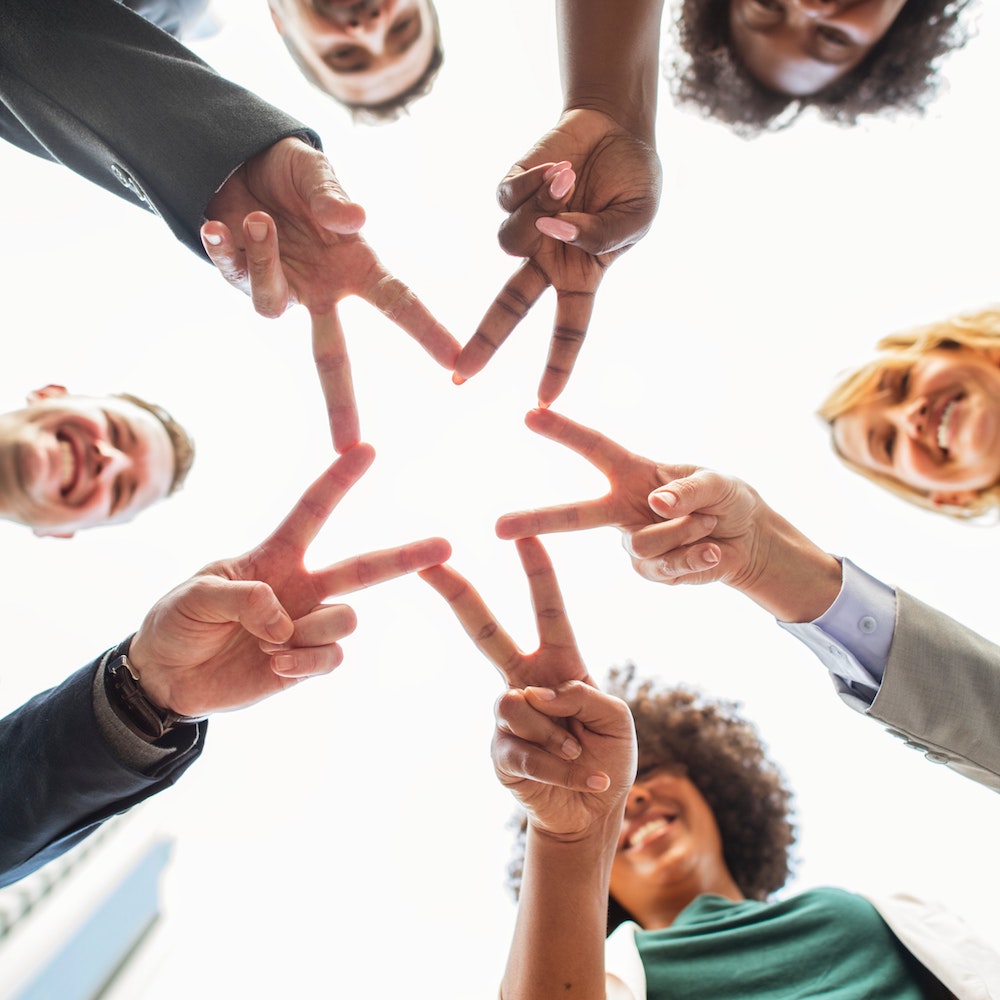 Chain of fingers creating a star