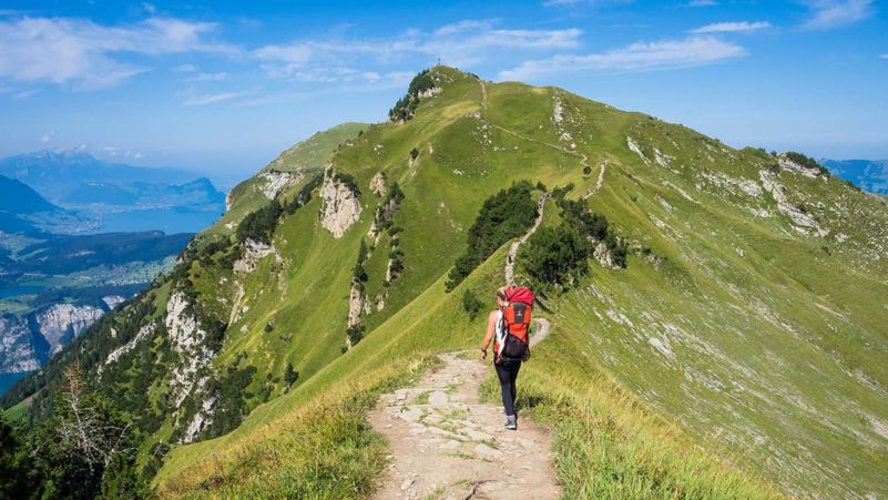 Woman walking along Mountain