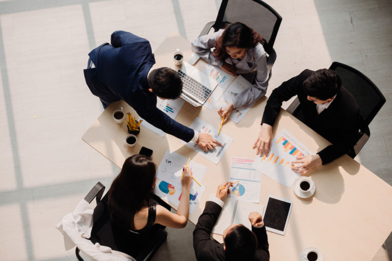 Marketing Analysis Accounting Team Teamwork Business Meeting Concept. Top view in office while people having a meeting