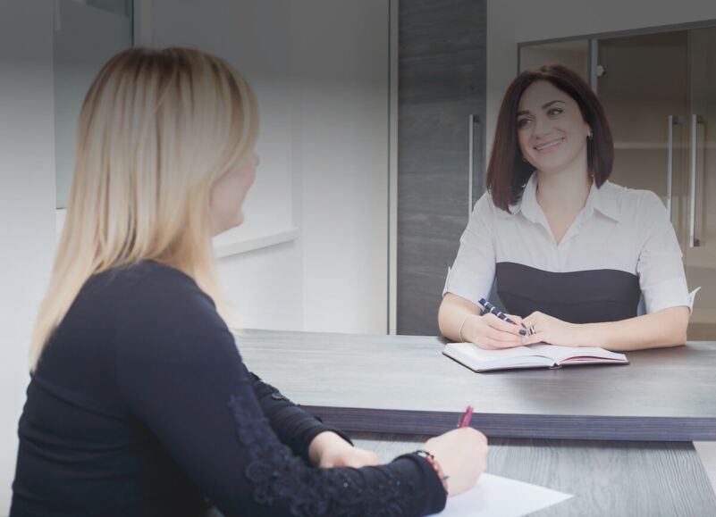 Two women holding a meeting