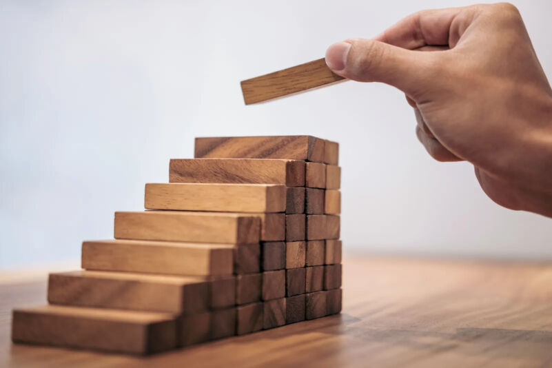 Stacking the wooden blocks